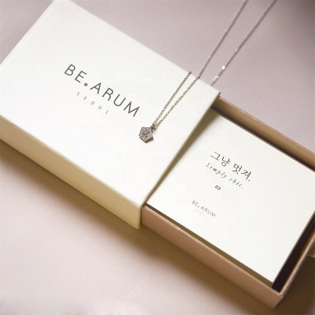 Usine de boîte de papier d'emballage de boucle d'oreille de mode blanche de conception personnalisée